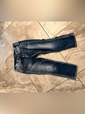 Silver Suki Mid Capri darker blue Fluid Jean 29/22.5